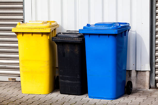 istock Three recycle bins on the street 471922620