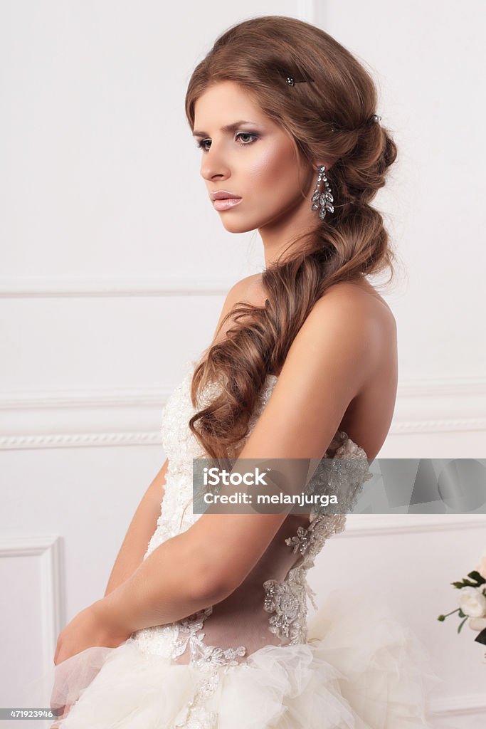 beautiful girl the bride on a background of bright stucco 2015 Stock Photo