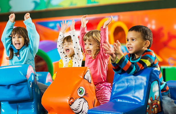 istock Ecstatic children in a playroom. 471924533