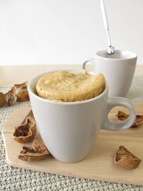 istock Microwaved walnut cake is baked right in the mug 471924856