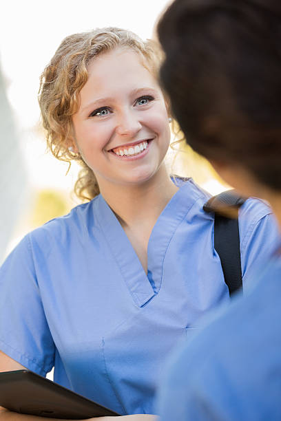 istock Nursing or medical students talking outside after college class 471925323