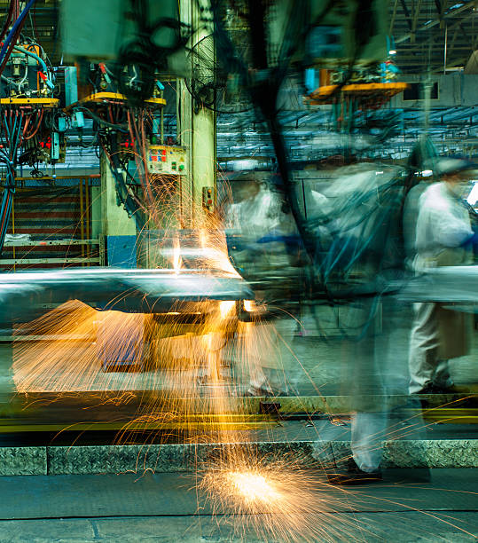 istock Automobile factory welding assemble line 471926257