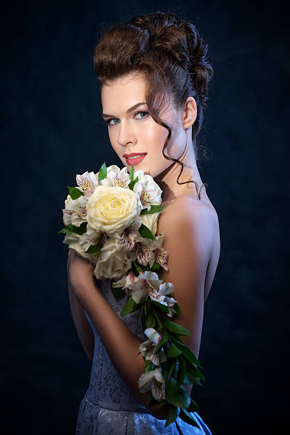 istock Gorgeous Brunette bride with wedding bouquet. 471929236