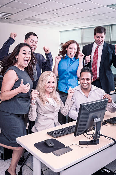 istock Stock traders working together (celebration) - VIII 471929395