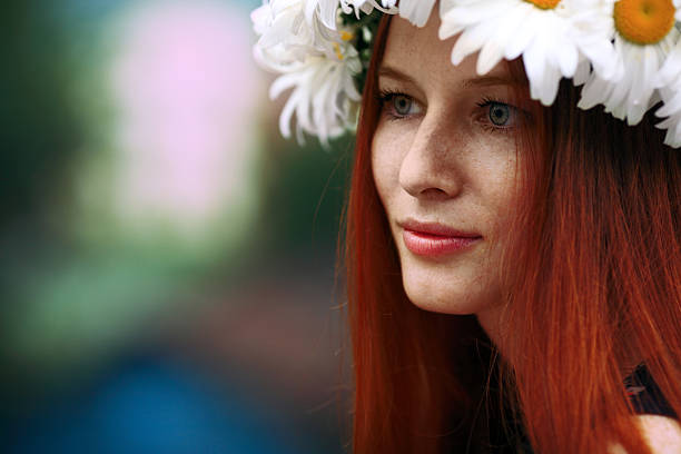 istock girl with a wreath on his head 471929559