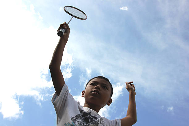 menino sob o sol de badminton - 2546 imagens e fotografias de stock