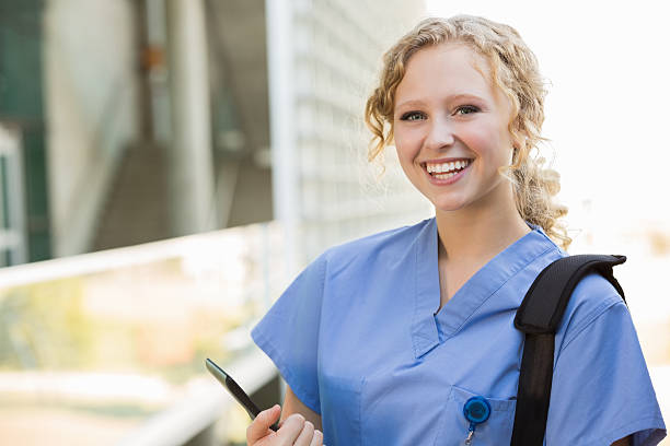 istock Happy medical or nursing student standing outside college 471931745