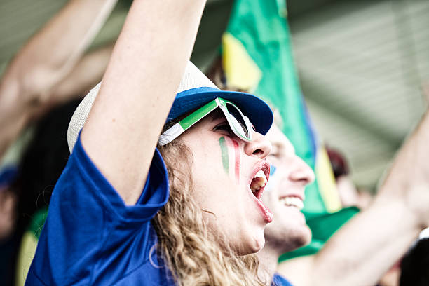 istock Sports fans cheering a game 471931959