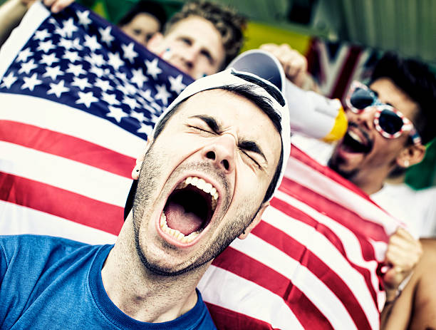 istock Sports fans cheering a game 471931999