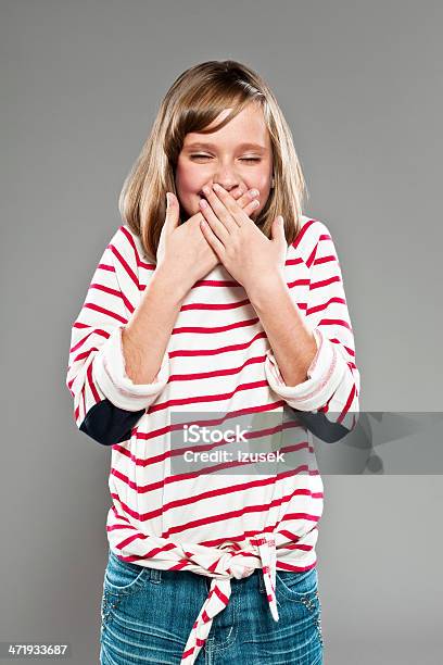 Laugh Stock Photo - Download Image Now - 10-11 Years, Child, Hands Covering Mouth