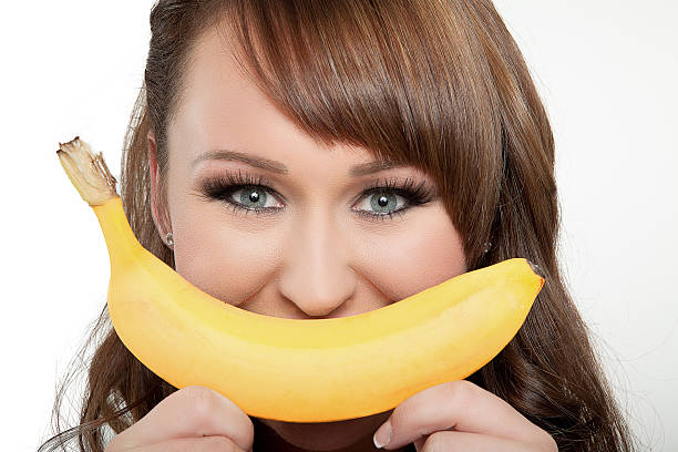 istock woman with banana 471937169