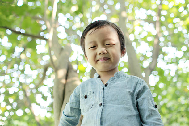istock Cute children playing in the park 471937775