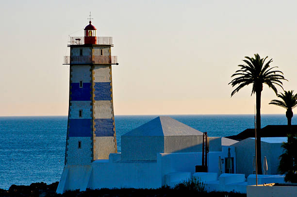 istock Cascais lighthouse at dusk 471939153