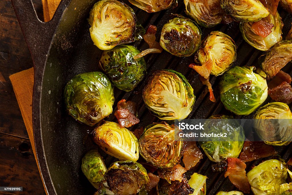 Homemade grilled Brussels sprouts Homemade Grilled Brussel Sprouts with Fresh Bacon Brussels Sprout Stock Photo