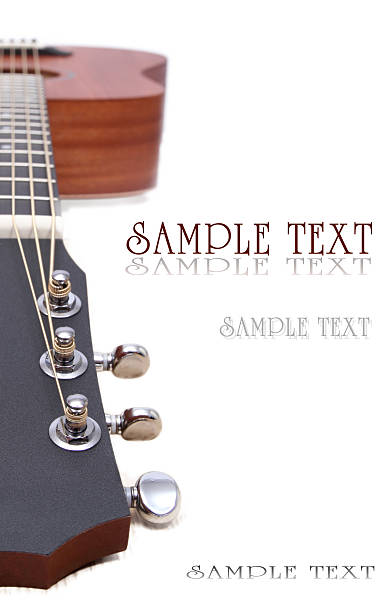 istock acoustic guitar lay on white 471939753