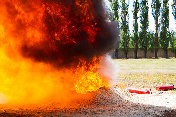 istock Competition rescuers. Ground to extinguish flames 471940891