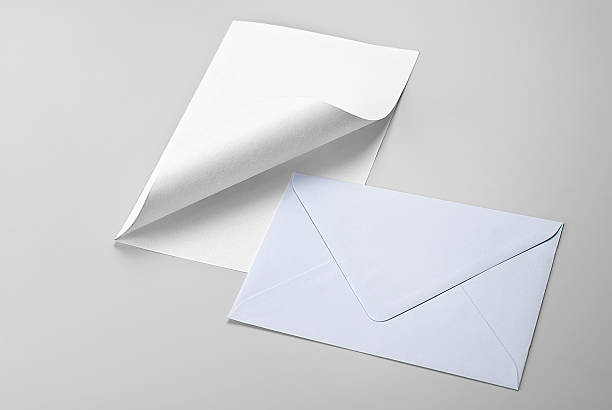 istock Sheet of paper with curled corner and envelope 471941073
