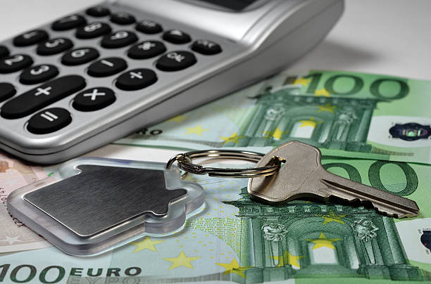 istock Calculator, money and house key 471945725