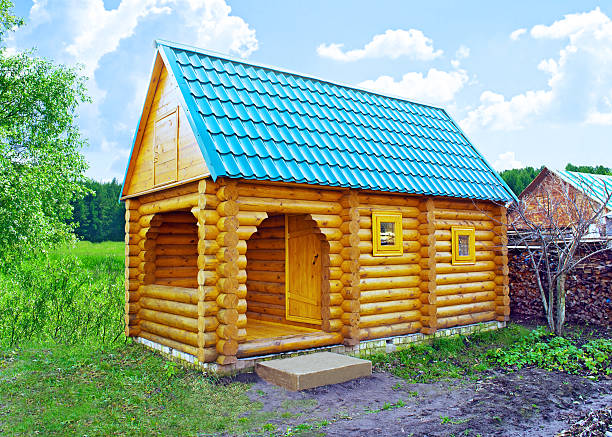 istock Log house in the garden 471947509