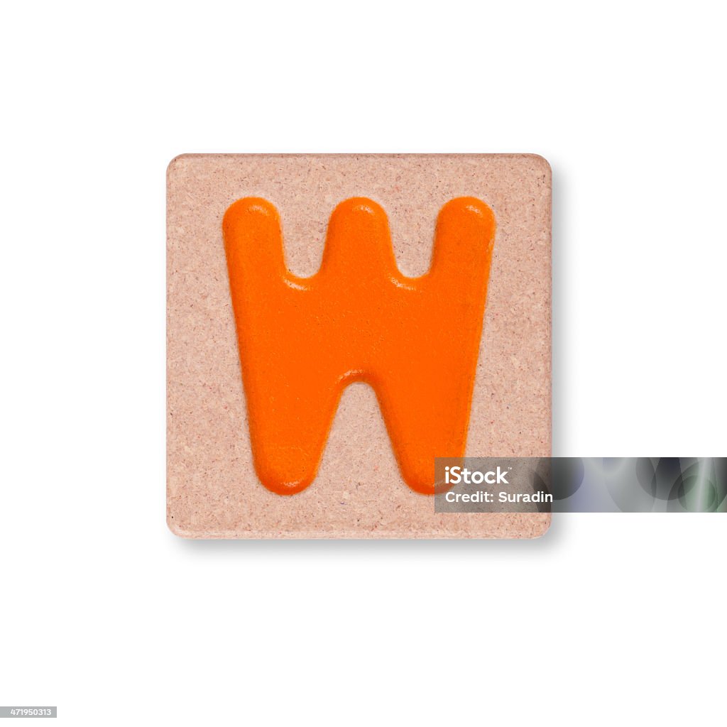 Letter W isolated on white background Letter W on wooden block isolated on white background Alphabet Stock Photo