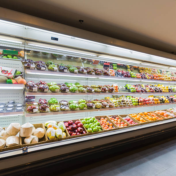 istock Long fruit and vegetable aisle in a supermarket 471952729