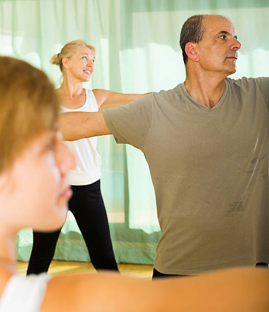 istock Couple of retirees at gym 471952880
