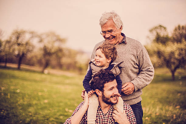 tre generazioni - grandpa portrait foto e immagini stock