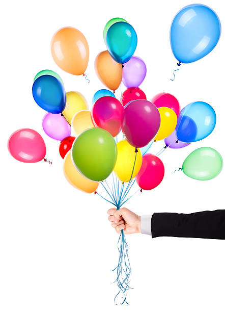 istock flying balloons with Businessman hand 471956277