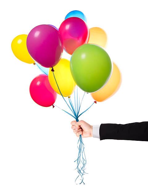istock flying balloons with Businessman hand 471956319