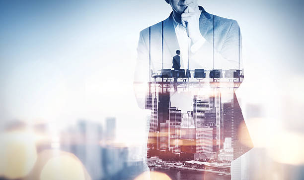 istock Double exposure concept with thinking businessman 471956838