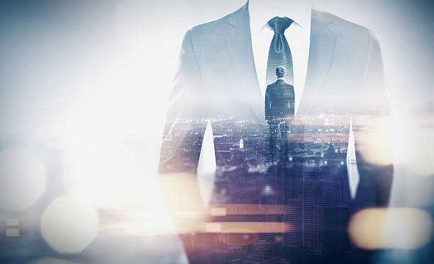istock Double exposure concept with businessman silhouette 471957454