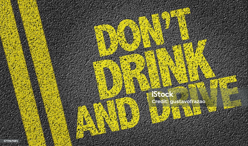 Don't Drink and Drive written on the road Drunk Driving Stock Photo