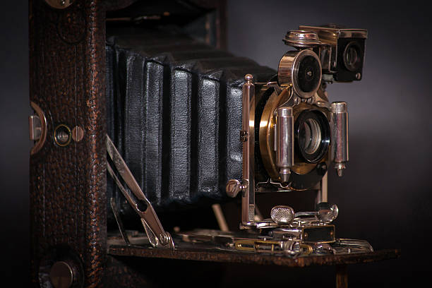 Old vintage camera Old vintage camera camera engraving old retro revival stock pictures, royalty-free photos & images