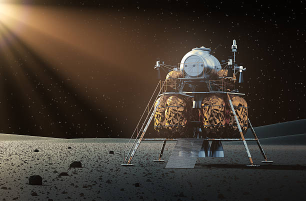 istock Lunar lander on surface of moon with beam of light shining 471957948