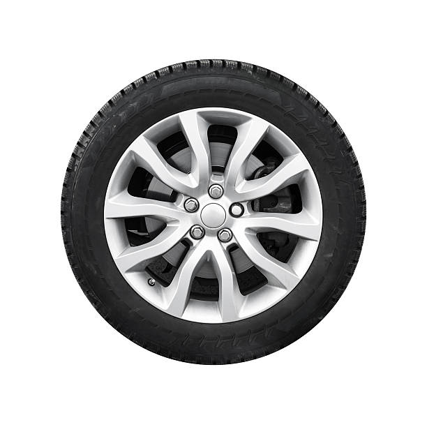 istock New shiny automotive wheel on light alloy disc isolated 471958420