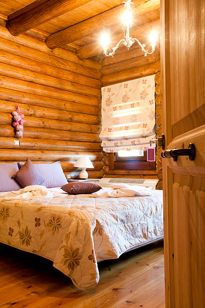 log cabin schlafzimmer - rustic bedroom cabin indoors stock-fotos und bilder