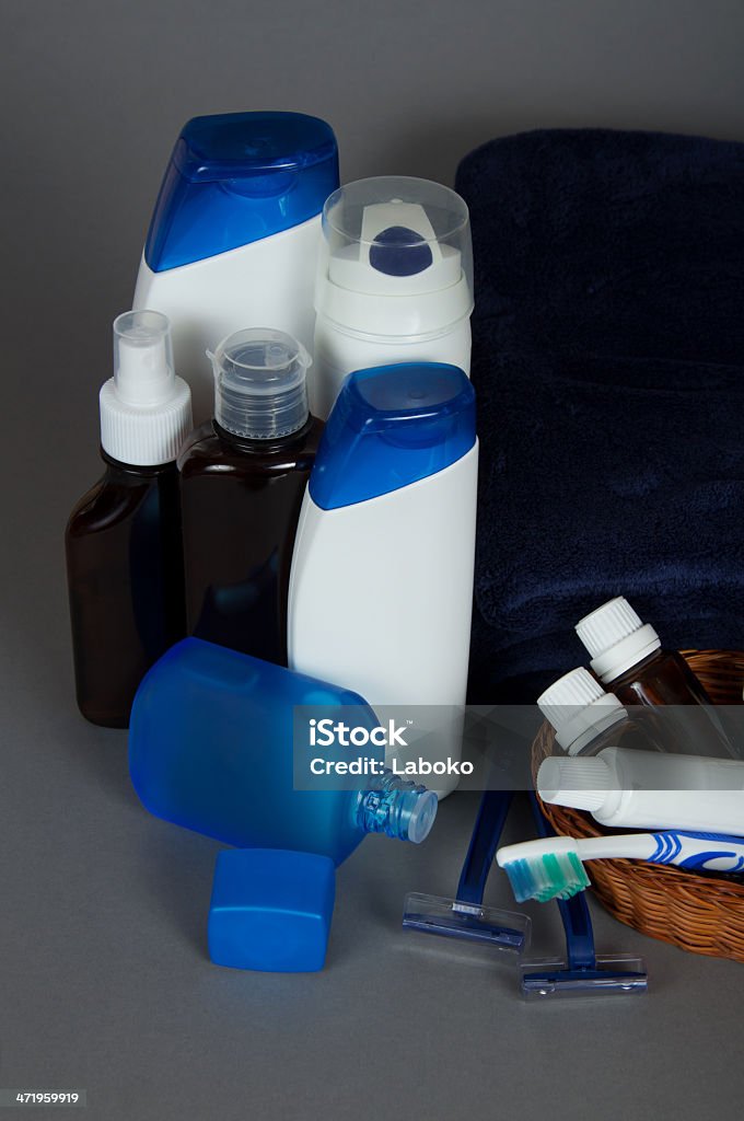 Many different color tubes and bottles for hygiene Many different color tubes and bottles for hygiene, health and beauty on a grey background Adult Stock Photo