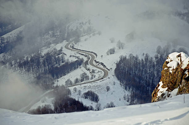 istock Road in the fog 471960773