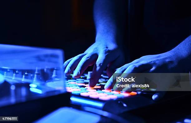 Djs Hand On Audio Mixer Stock Photo - Download Image Now - Activity, Art, Arts Culture and Entertainment