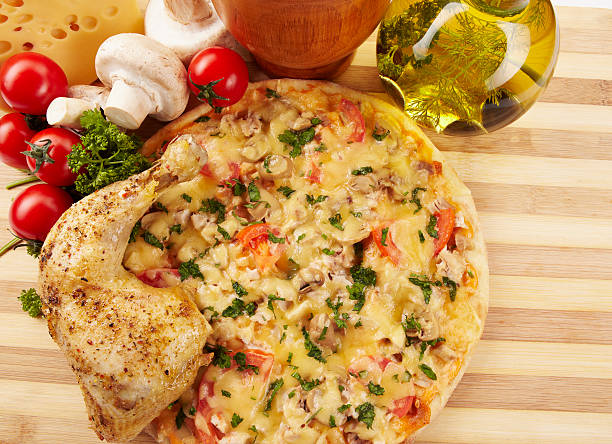 istock Pizza with chicken and mushroom. italian kitchen. Studio 471961171
