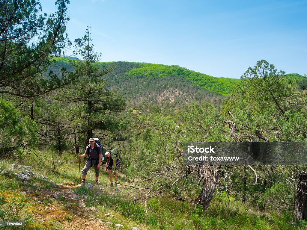 Hikers Hikers couple trekking in Crimea mountains Activity Stock Photo