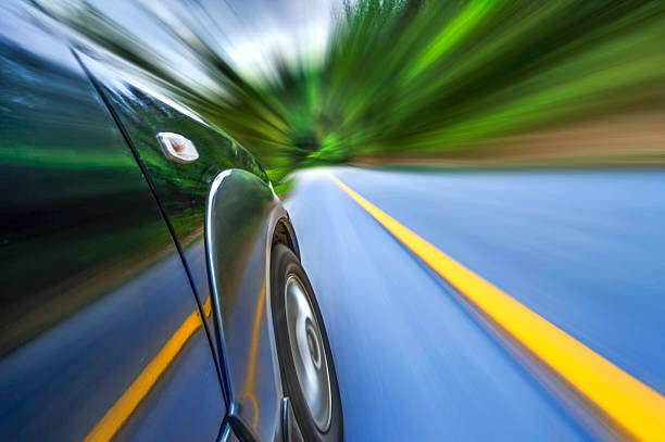 istock car on the road with motion blur background. 471964664