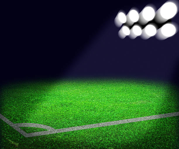 istock Football Stadium Spotlight Background 471964845