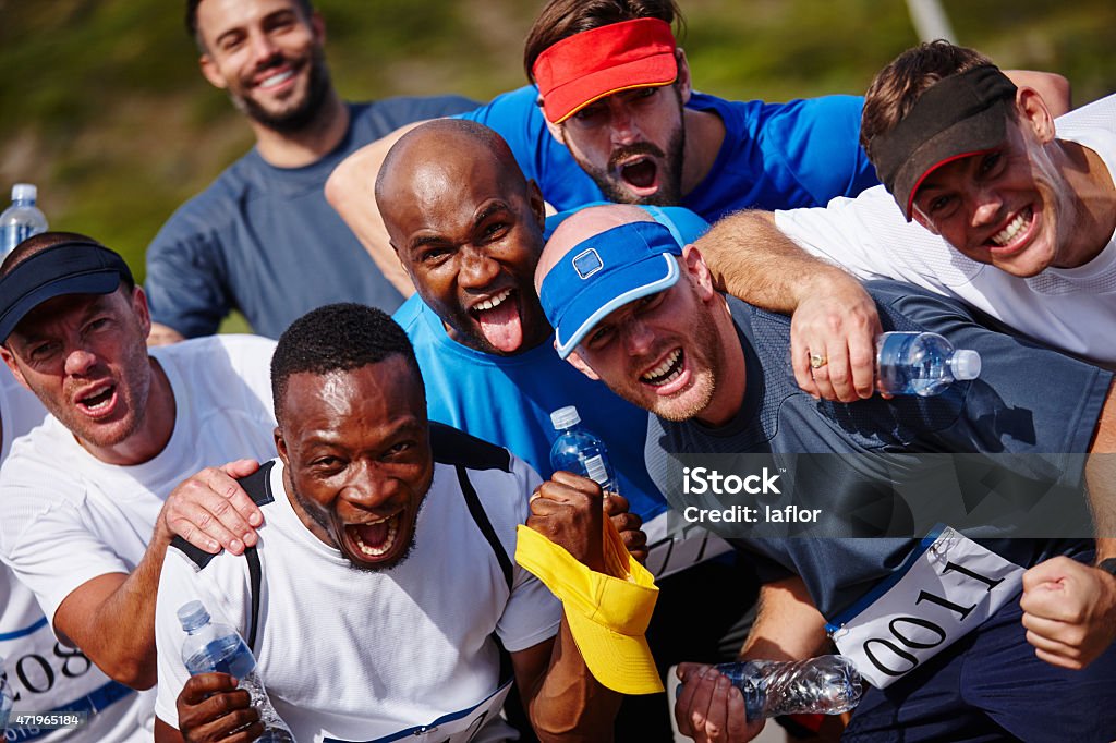 Psyched for their first marathon Portrait of a group of excited young men standing together after running a marathonhttp://195.154.178.81/DATA/i_collage/pu/shoots/804527.jpg Success Stock Photo