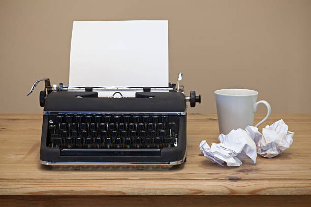 istock Old typrwriter and blank paper. 471968011