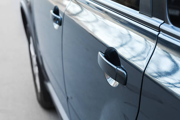 istock Closed rear door handle. Modern blue car 471968348