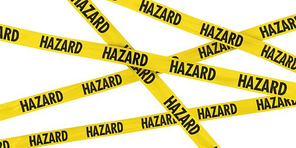 istock Yellow and Black HAZARD Barrier Tape Background 471969218