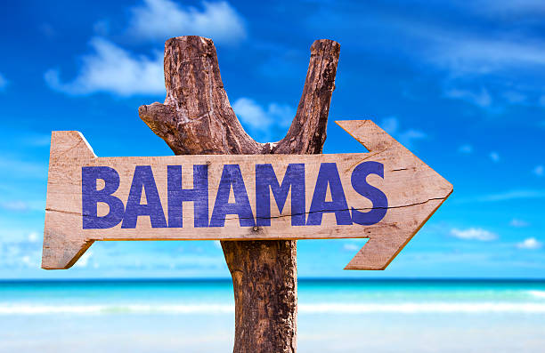 istock Bahamas sign with beach background 471969328