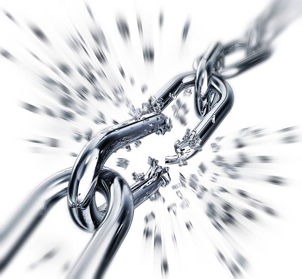 istock Chain links breaking apart symbolizing freedom 471973097