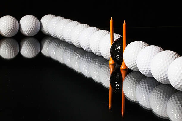 istock Golf balls on the black background 471976673